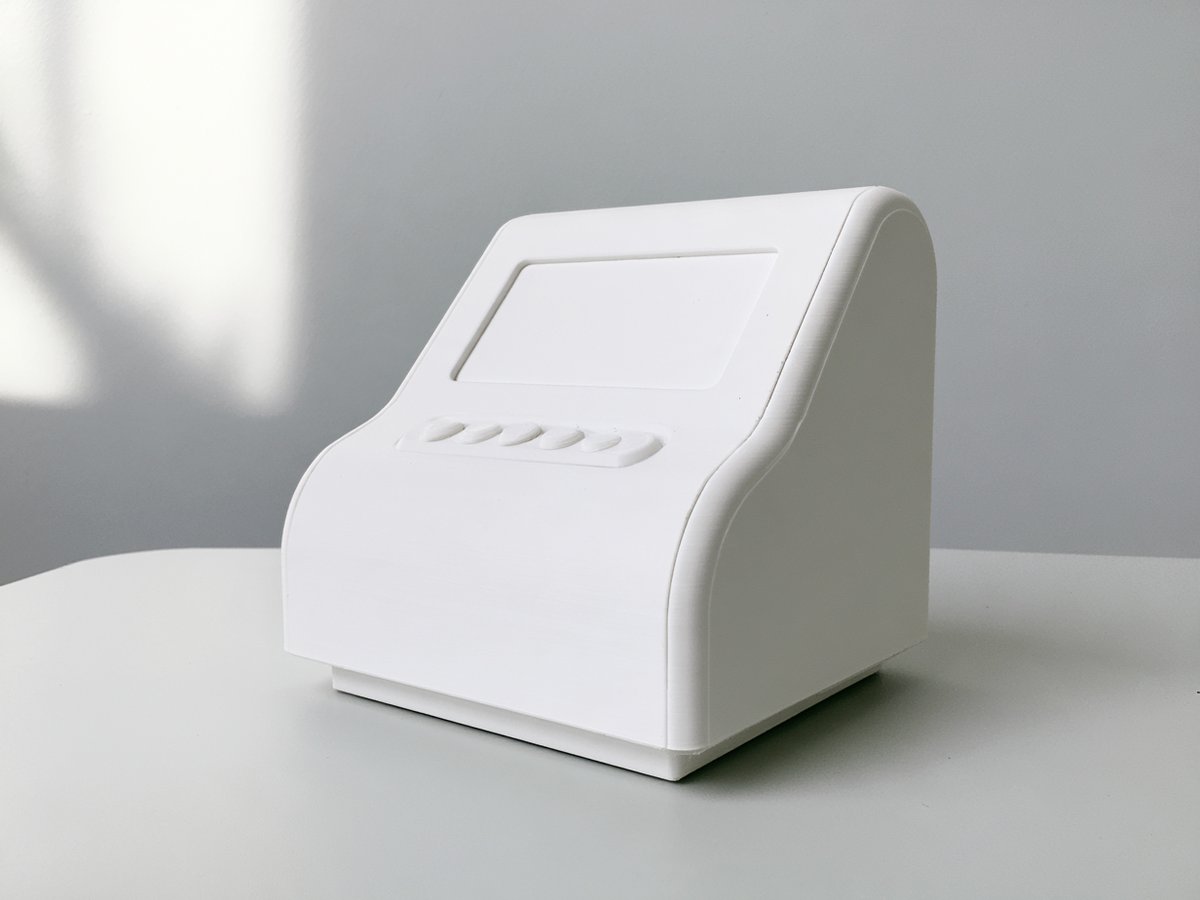 White scale model of a compact industrial control console