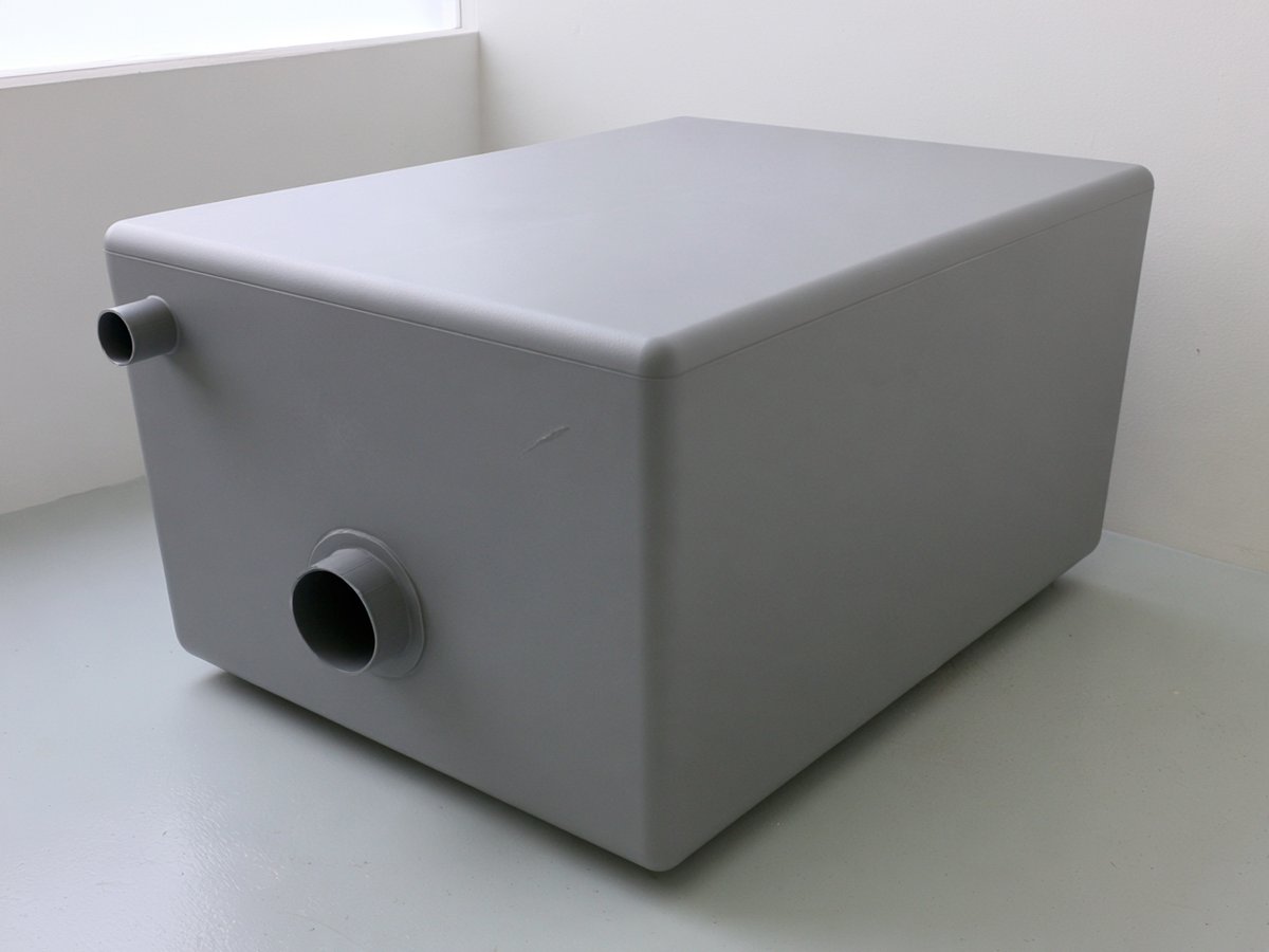 Grey PVC process tank with neatly joined seams and a flanged outlet